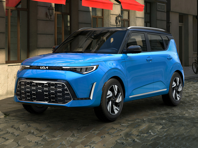 A sky blue 2023 Kia Soul parked in front of a building. | Kia dealer in Sherwood, AR | Crain Kia of Sherwood