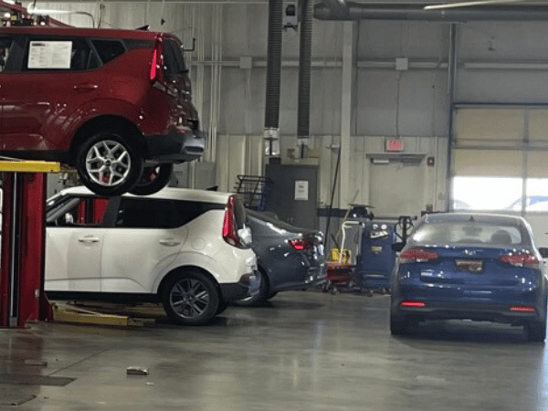 Cars being serviced at Crain Kia of Sherwood