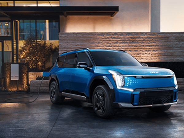 Blue EV9 Outside of Home