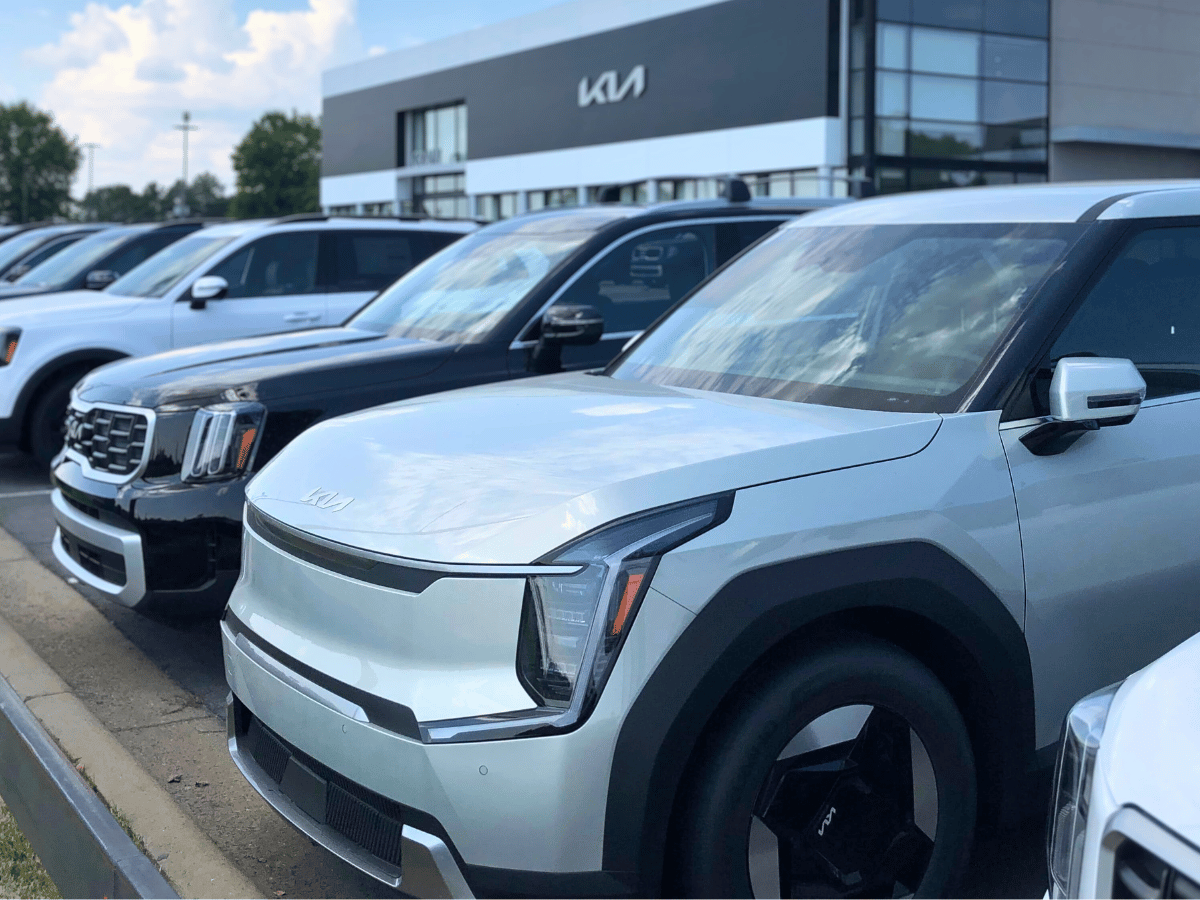 Grey EV9 and Black Telluride at Crain Kia of Sherwood